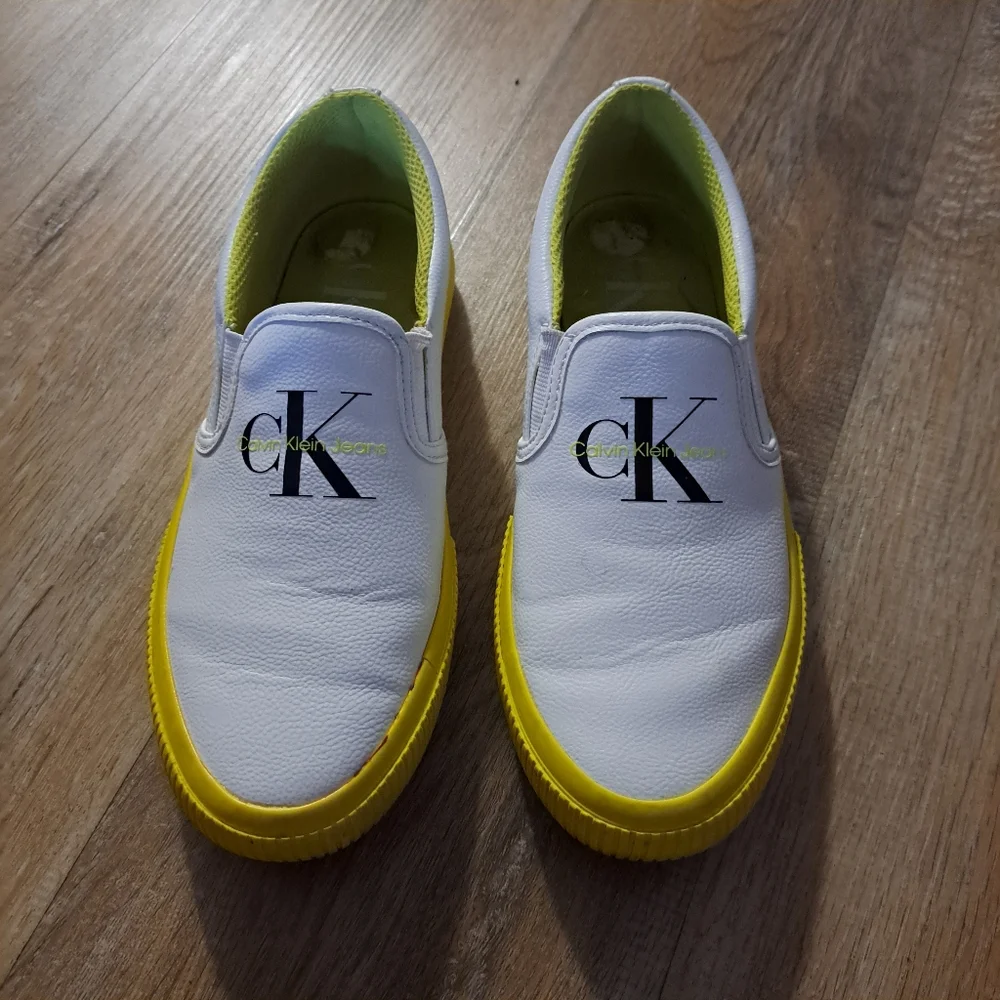 Calvin Klein White Slip-On Sneakers Yellow Accents Women's Size 7 1/2